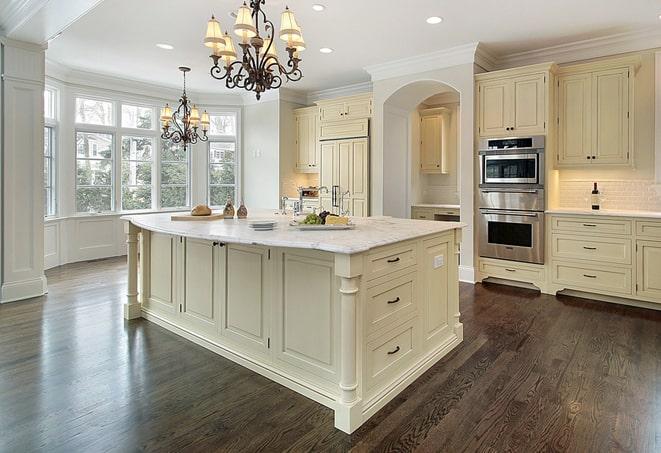 a modern kitchen with newly installed laminate flooring in Fort Belvoir